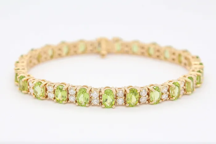 14KY 12.70 CTTW PERIDOT AND DIAMOND BRACELET 2.30 CTTW SUNRISE JEWELRY MFG CORP Bracelets