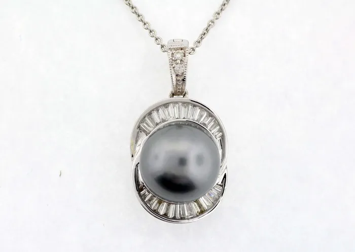 FULLERS PURCHASE FROM PUBLIC 18KY 11 MM TAHITIAN PEARL AND DIAMOND PENDANT .72 CTTW G-VI2 Necklaces